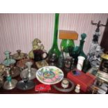 A large quantity of miscellaneous ornaments to include a green glass decanter and stopper and a