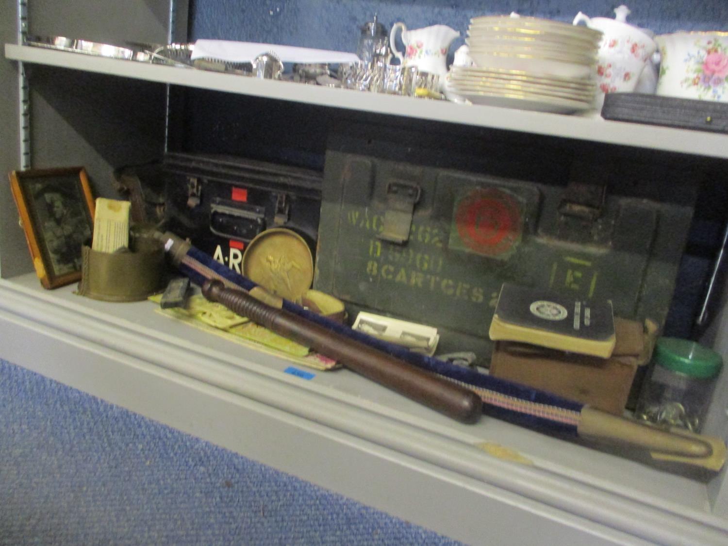 A mixed lot of mainly military related items to include a cartridge box, trench art, truncheon and