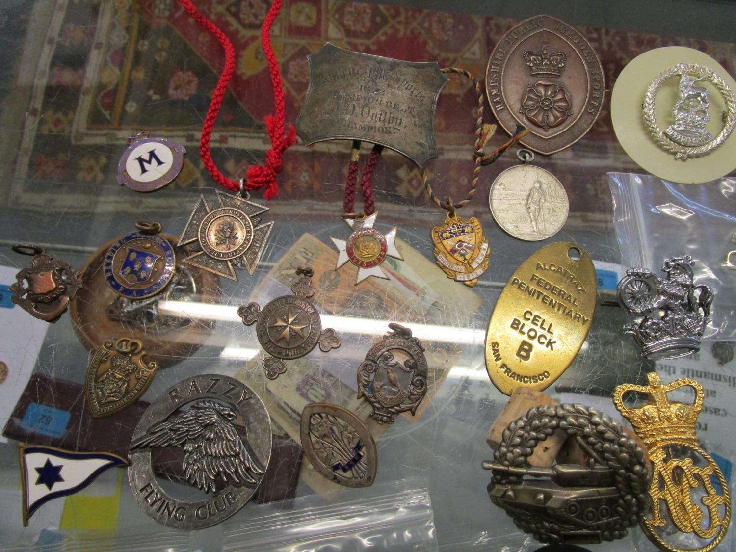 A quantity of military cap badges, school and club badges, sports badges and medals and other - Image 2 of 5