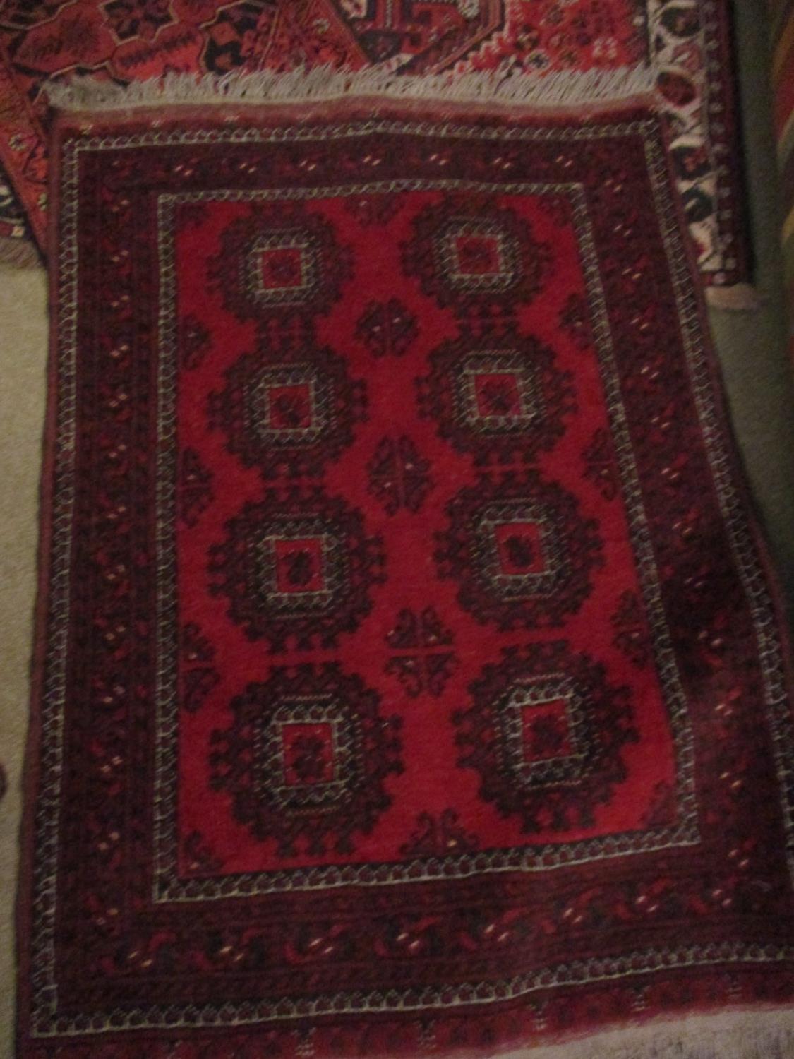 A Turkish red ground gull decorated rug with a small Bokhara prayer mat with red ground and barbers? - Image 2 of 4