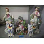 Five late 19th century porcelain figures to include one of a kneeling man and a hunting dog A/F