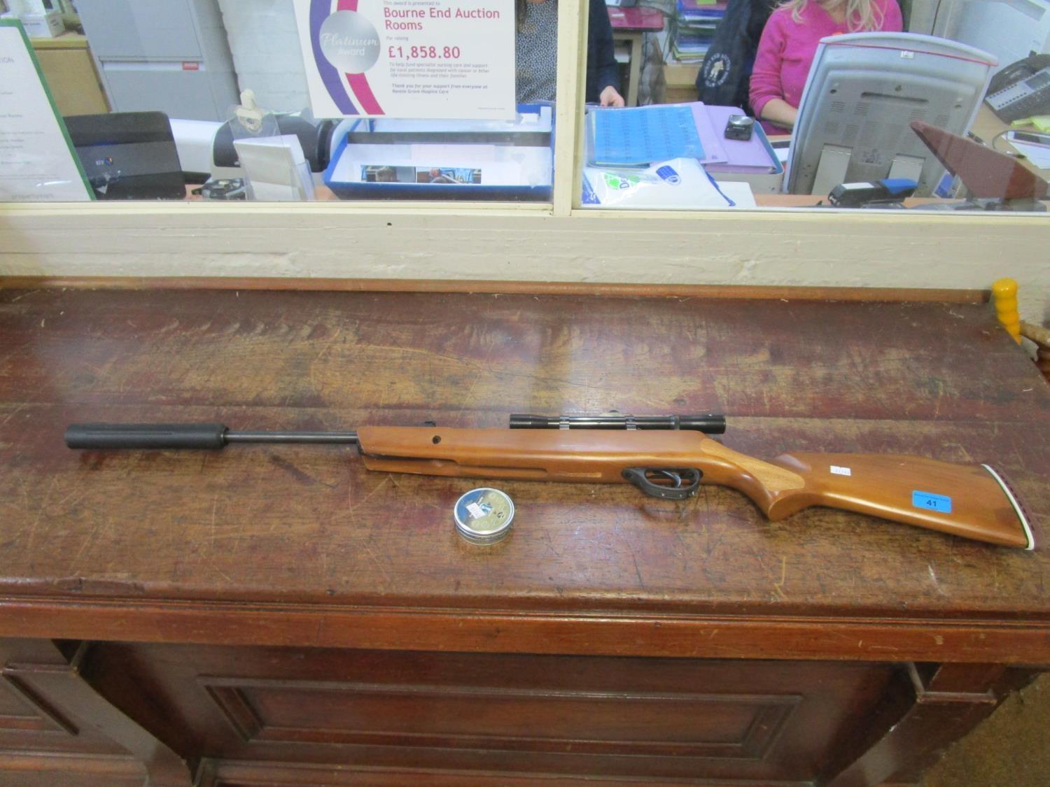 An Edgar Brothers Breaker 900 x Hatsan air rifle with sight and a tin of pellets