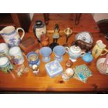 A quantity of miscellaneous ornaments to include Wedgwood jar and cover, miscellaneous treen ware to