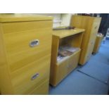 Two oak veneered filing chests of 3 deep drawers 47" x 18" x 20", together with a matching smaller