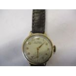 A vintage Buren Grand Prix gents wristwatch on brown leather strap