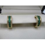 A pair of Tivon 18ct yellow gold earrings set with emeralds, approximately 1.23ct and diamonds