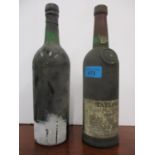 Two bottles of Port, Taylors over 40 years old and another un-labled, a modern cocktail shaker and