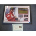 A large Formula 1 photo montage, signed by Fernando Alonso, 18 1/2" x 28 1/2", mounted in a glazed