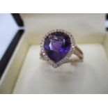 A Tivon 18ct yellow gold ring set with an amethyst approximately 3.32ct and diamond, approximately