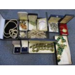 Costume jewellery to include vintage necklaces, a bangle, faux pearls and two 9ct gold rings set