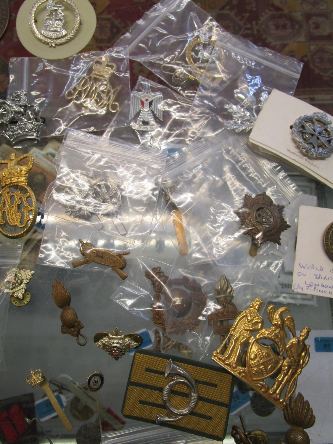 A quantity of military cap badges, school and club badges, sports badges and medals and other - Image 3 of 5