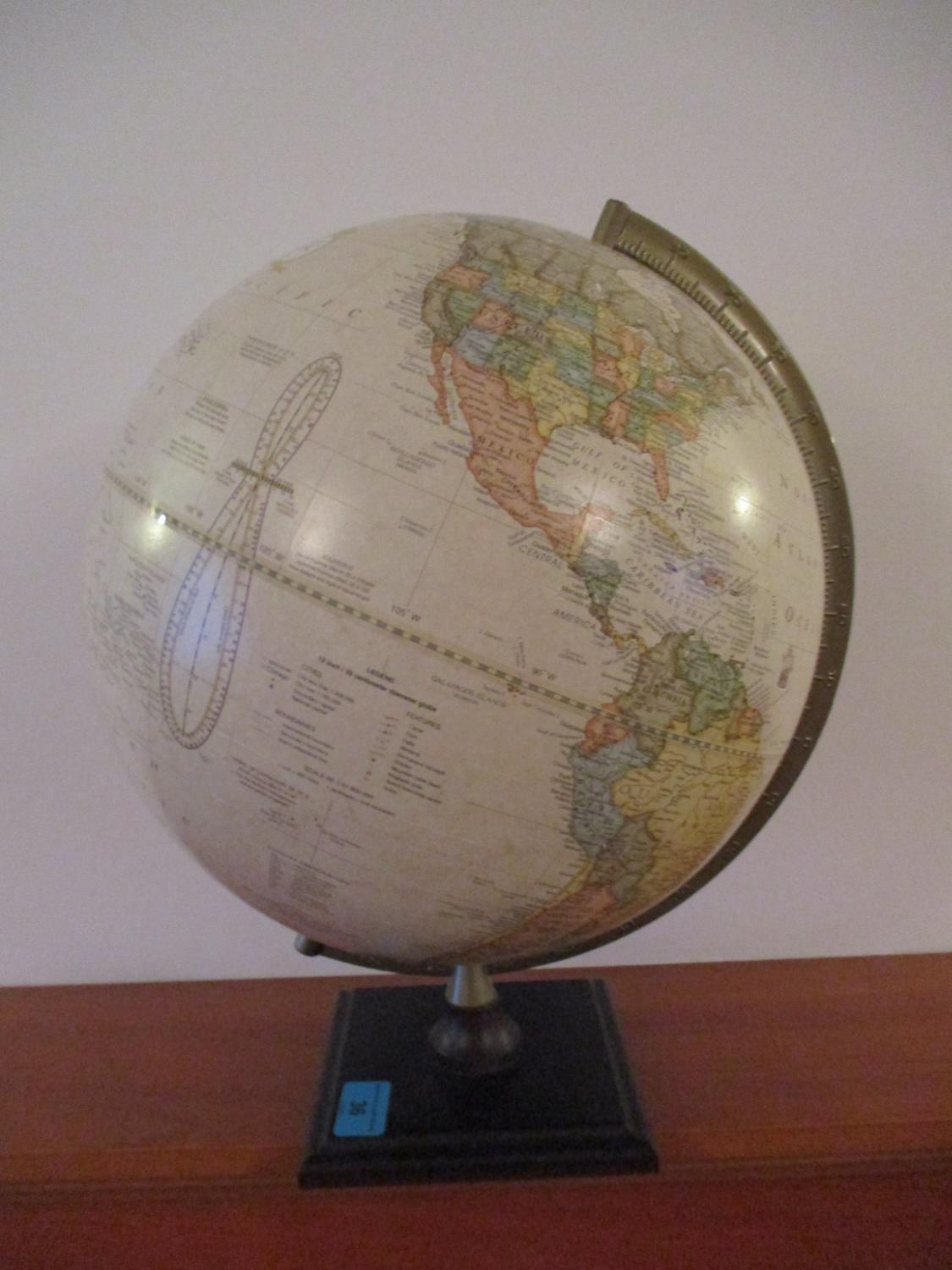 A George F Cam classic globe on stand