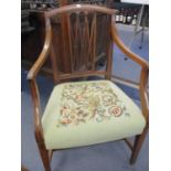 A George III mahogany carver having a tapestry seat