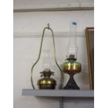 A Victorian brass hanging oil lamp (shade deficient), together with a Victorian oil l amp to include