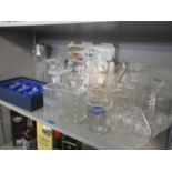 Glassware to include nine decanters and two silver plated claret jug along with other items