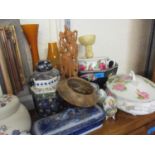 Oriental inspired items to include an Arcadian ware bowl A/F, together with a carved Indonesian
