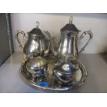 A silver plated four piece teaset and a tray