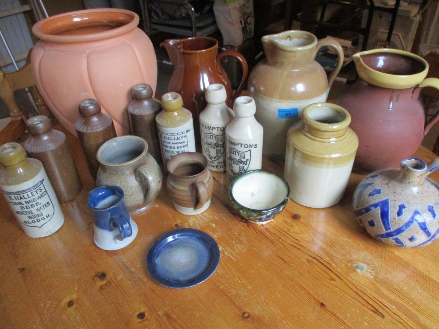 A selection of miscellaneous stoneware to include mixed ginger beer flasks