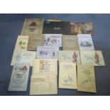 A collection of cigarette cards mounted in albums to include military uniforms