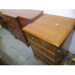 Reproduction yew wood furniture to include a breakfront sideboard, bookcase with two inset drawers