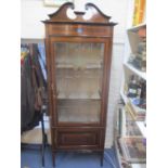 An Edwardian mahogany inlaid display cabinet with cupboard below and tapering square legs, 78" h x