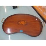 An Edwardian mahogany inlaid kidney shaped, twin handled tray