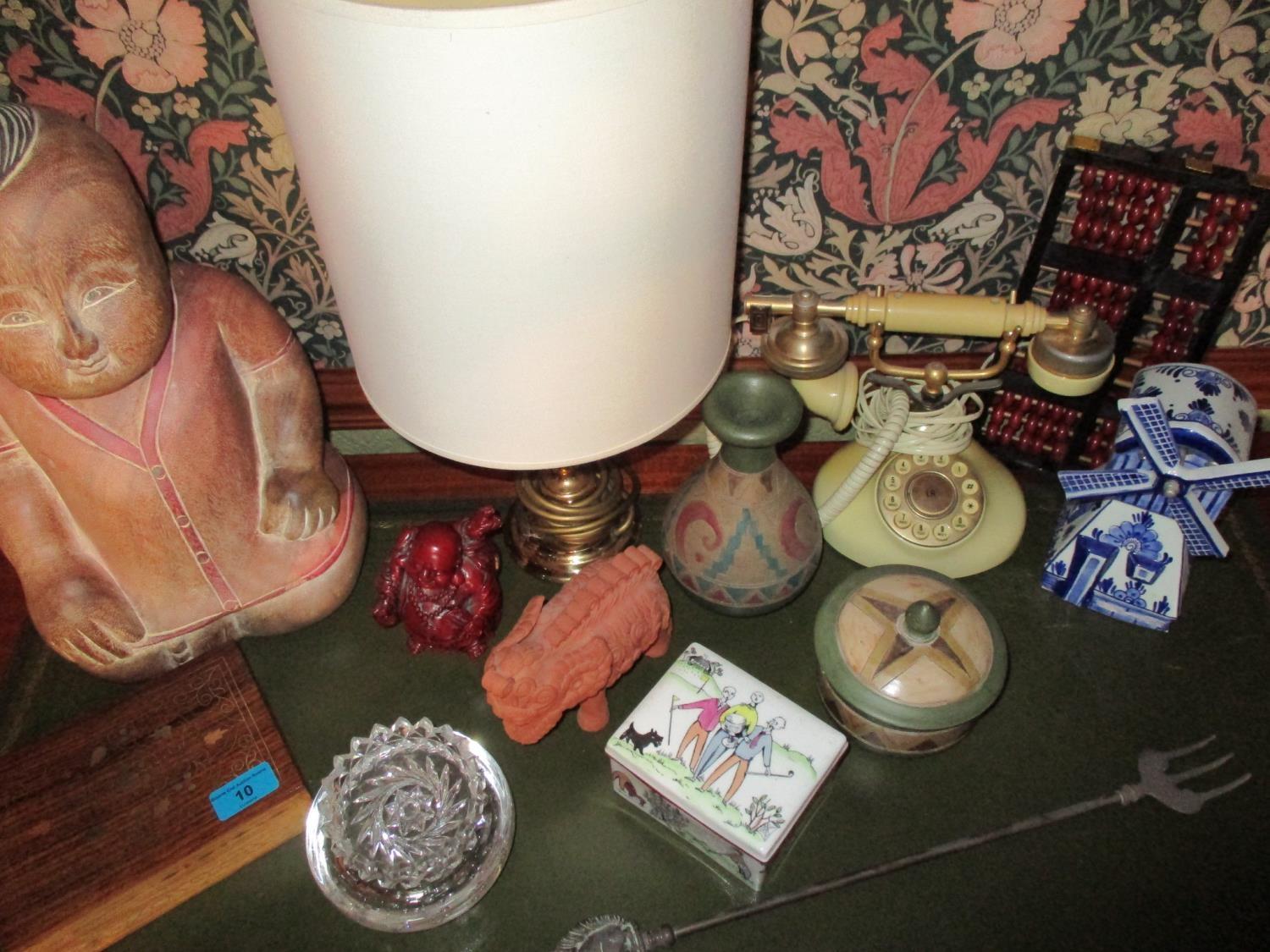 A red resin Buddha, Crown Staffordshire, a Betacom vintage telephone, a brass lamp and other items