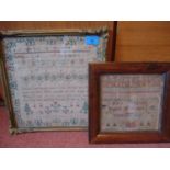A William IV framed sampler dated 1831 with alphabet decorated with tree and foliage and a second