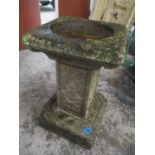 A reconstituted stoneware bird bath having square shaped column, 20 1/2"h x 12"w