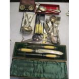 A cased silver rimmed carving set, together with a selection of silver plate to include cased salt