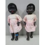 Two Pedigree black faced dolls with jointed limbs and brown sleeping eyes, circa 1950