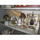 A mixed lot to include collectors plates, framed prints, brass table lamps, Capodimonte figural