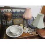 A mixed lot to include a warming pan, table lamps, a C. Wright oil painting of a landscape and other