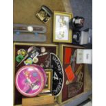 An assortment of items to include badges and watches, a Hackney Carriage and other signs, door