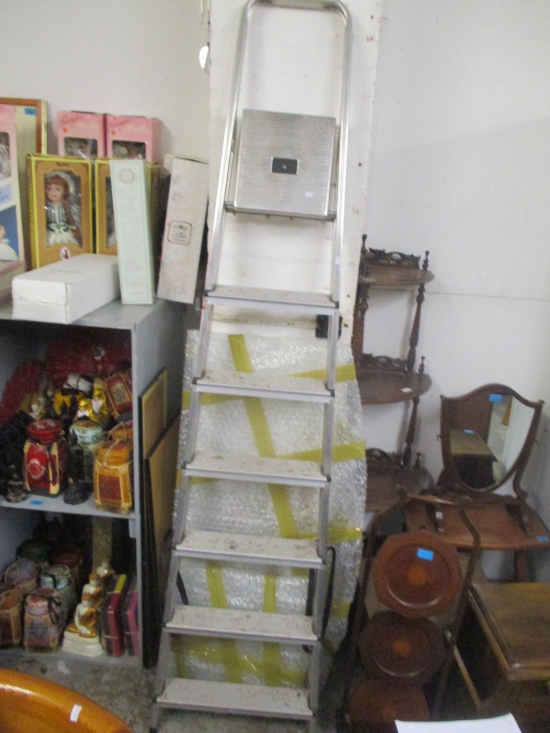 An aluminium folding ladder