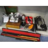 A mixed lot to include a snooker cue, telephones and portable DVD player