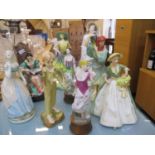 Nine figures, mostly Royal Worcester to include The Parakeet No 3087, Summer signed by Maureen