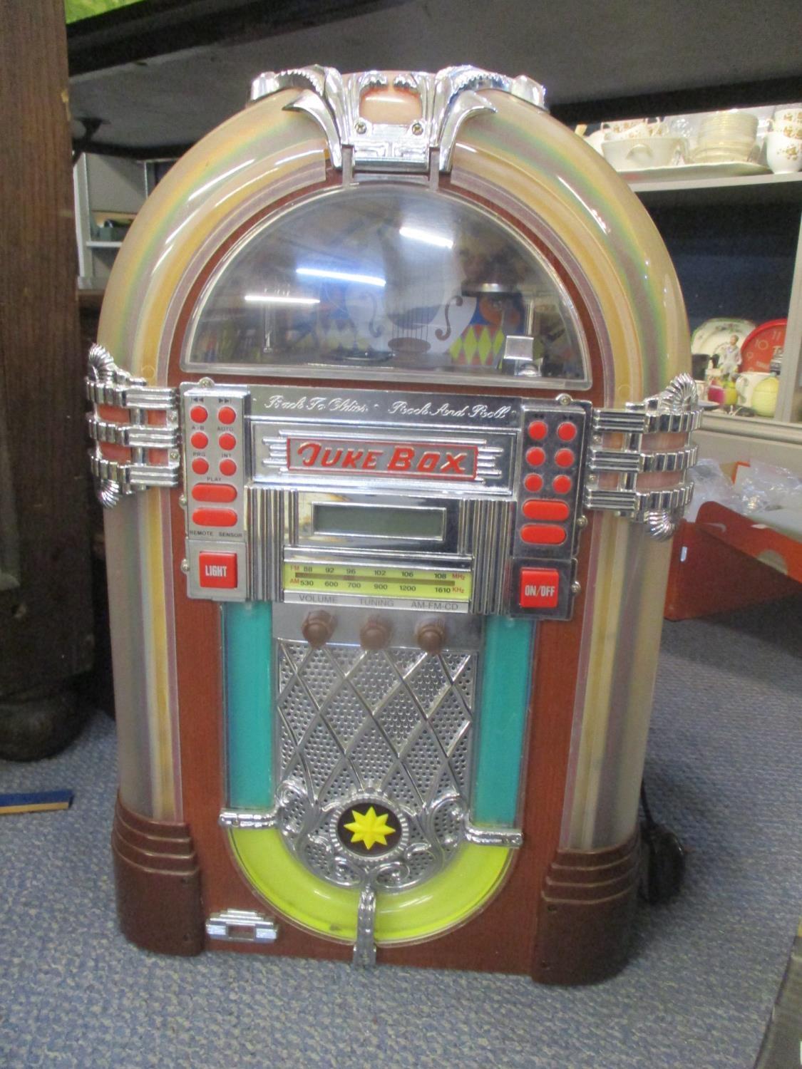 A CD radio player in the form of a jukebox, 19 3/4"h