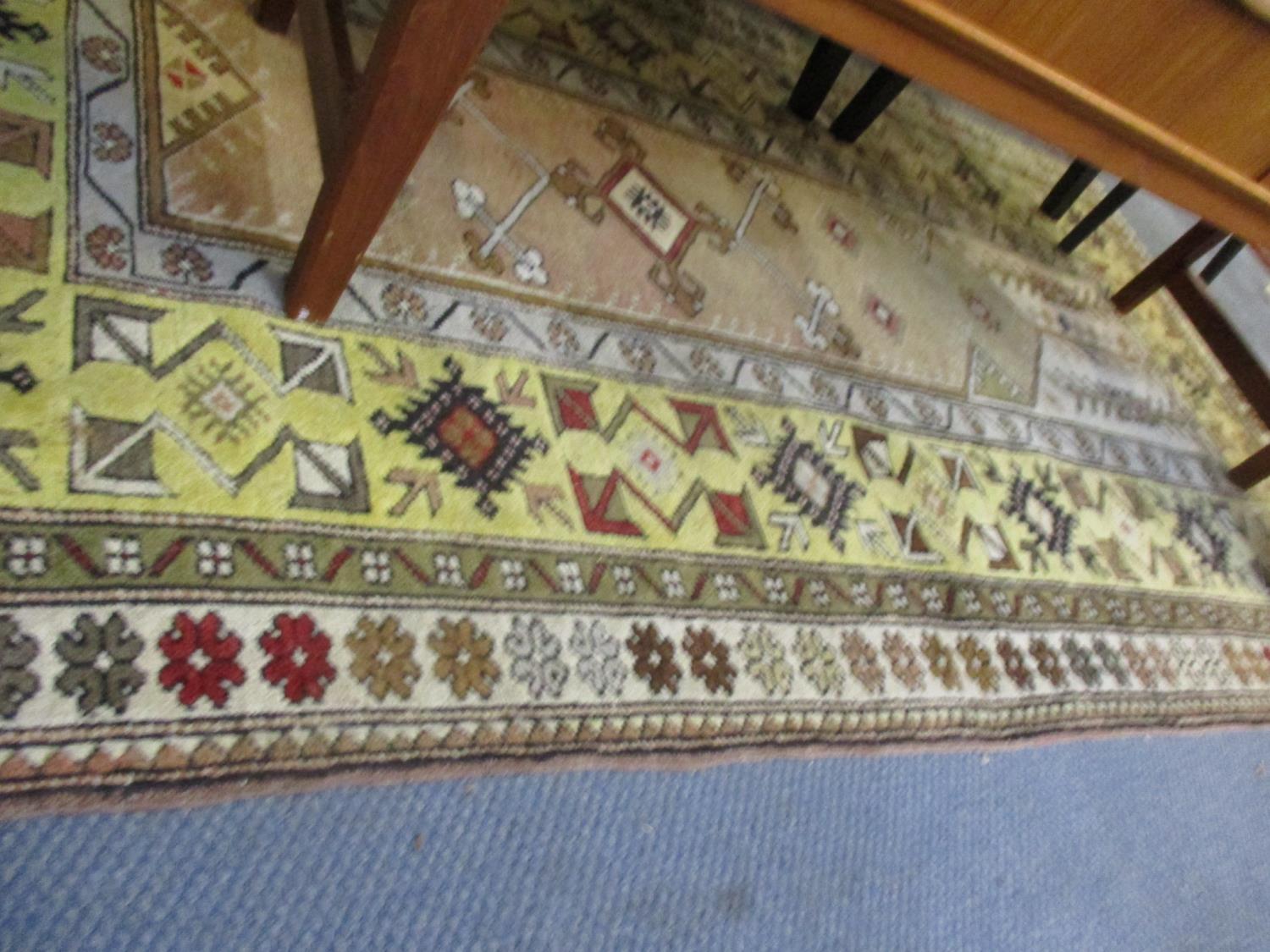 A Turkish yellow ground rug with geometrical design RAF