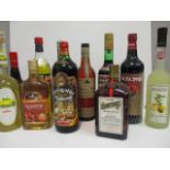 Eleven mixed bottles of Liqueurs to include Cointreau, Tia Maria and Martini