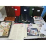 Four stamp albums containing Great Britain, Guernsey, Australia, Canada, India and New Zealand