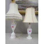 Two table lamps with fabric shades to include a Royal Worcester white glazed and twin handled lamp