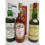 Three bottles of Scotch Whisky to include The Glenlivet, Laphroaig, Glenfarclas