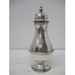 A George V silver sugar caster by Walker & Hall, Birmingham 1911, with a pierced, domed top, on a