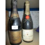 Two bottles of Champagne to include Veuve Clicquot Ponsardin 1969 and Moet & Chandon 1975