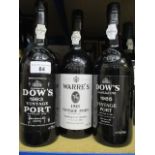 A bottle of Warres 1985 Vintage Port and two bottles of Dow's 1985 and 1983 Vintage