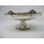 A mid 20th century silver pedestal dish by Walker & Hall, Sheffield 1939, with a reeded floral edge,