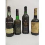 Four bottles to include Mederia Sercial, Blandy's Maderia, Duke of Cumberland, medium rich, Harvey's