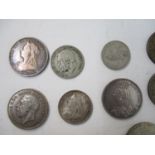 British and world coins to include eleven silver crowns, an American dollar 1921, a gilt Florin