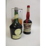 A bottle of Cherry Marnier liqueur and a boxed bottle of Benedictine liqueur